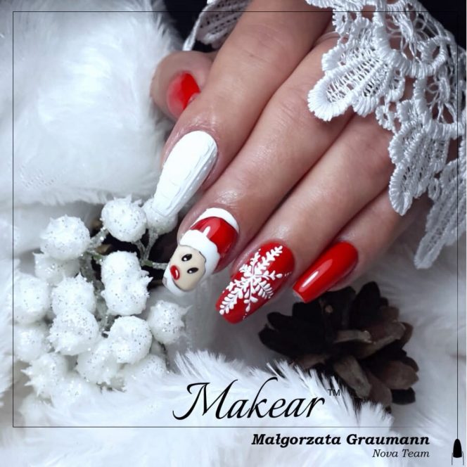 Christmas-themed manicure featuring: white textured nail, nail with a cute snowman face, and red nails with white snowflake designs, against a snowy white background and lace detail.