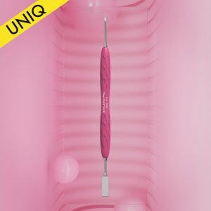 Pink-handled dental scaler/tool with a metal tip, displayed in a pink tray; used for dental cleaning and tartar removal; UNIQ branding visible in the corner