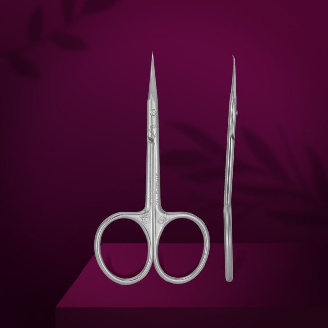 Pair of shiny surgical scissors with long pointed blades on a magenta background.