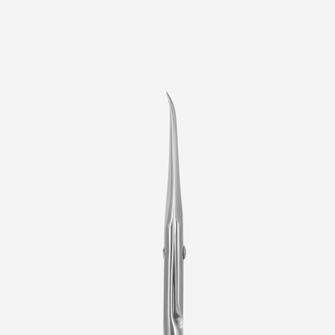 Close-up of a shiny, pointed knife blade with a narrow, tapered tip.