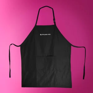 Black kitchen apron with front pocket and adjustable neck strap, logo reads 'STALEKS PRO' on a pink background.