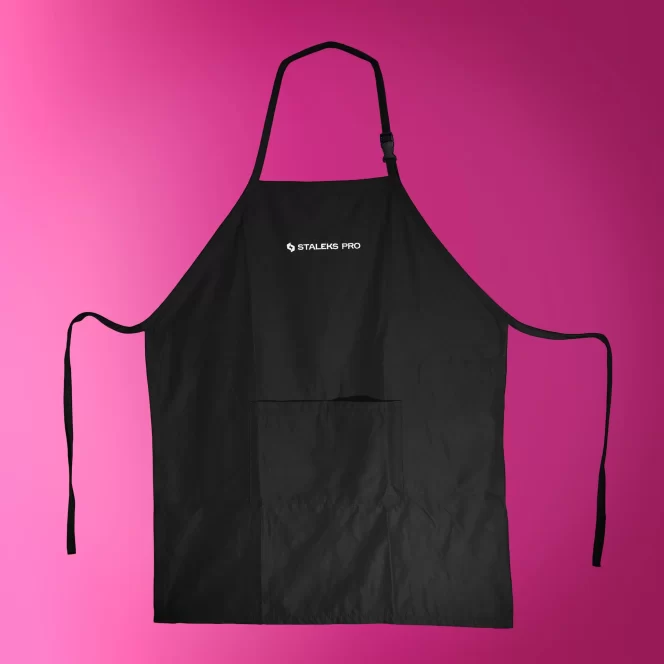 Black kitchen apron with front pocket and adjustable neck strap, logo reads 'STALEKS PRO' on a pink background.