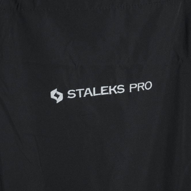 Black fabric with white embroidered logo reading 'STALEKS PRO' and a small geometric emblem to the left.