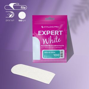 Magenta package labeled 'Expert White' for disposable foot files, with a white foot file beside it on a purple surface; highlights 100 grit.